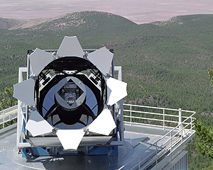 A photo of the SDSS's telescope in front of
the mountains in southern New Mexico